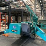 Maeda 305 spider crane operating inside a factory warehouse for internal lifting project