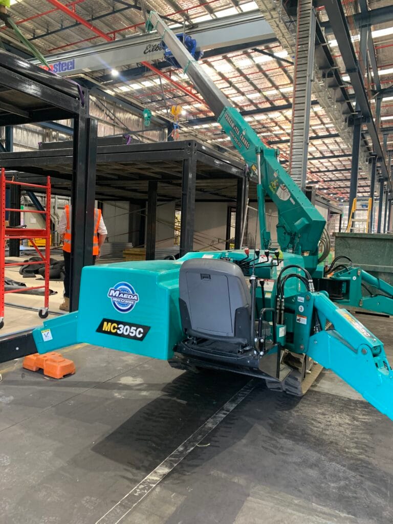 Maeda 305 spider crane working inside a factory warehouse in Sydney
