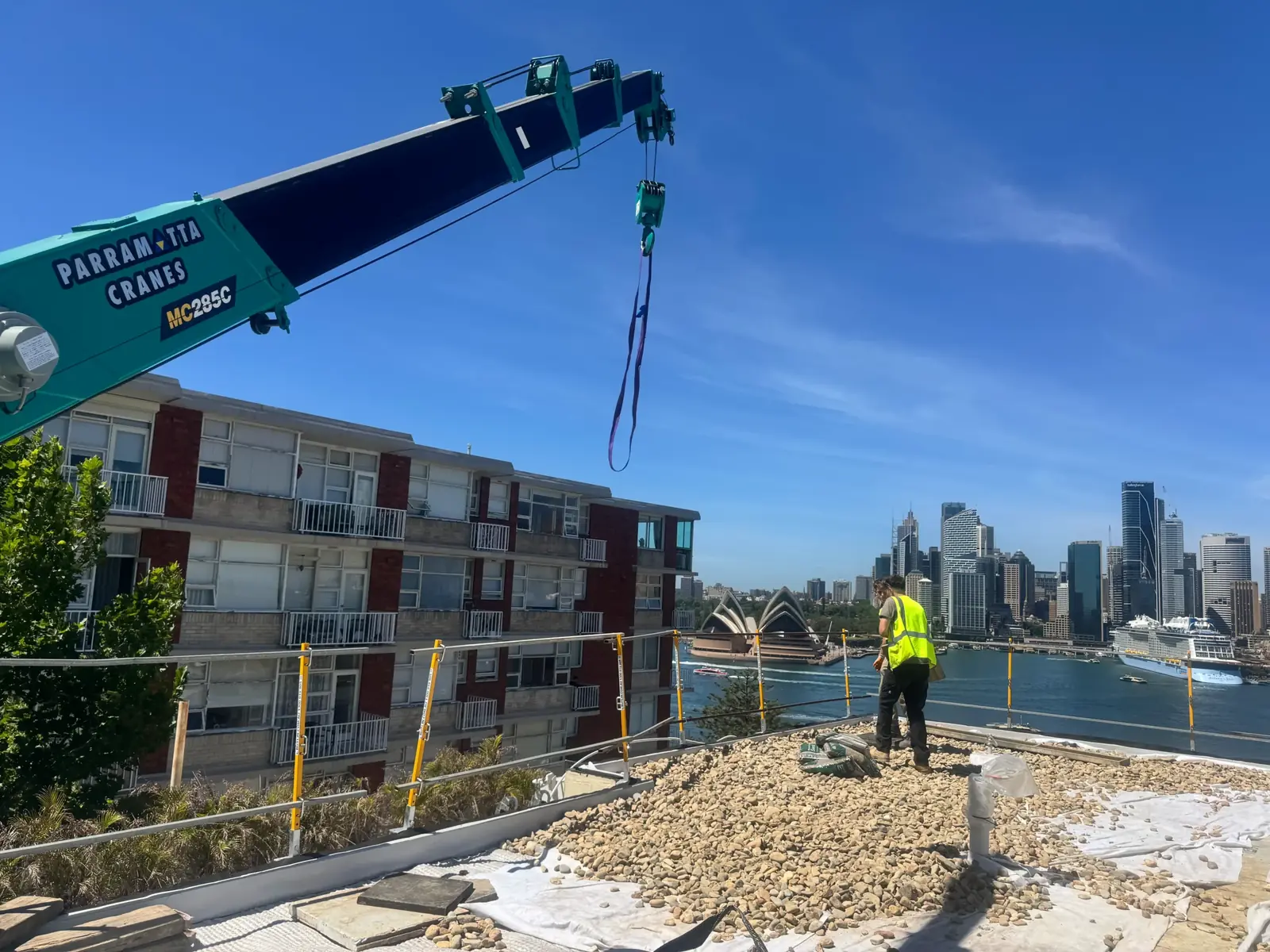 Maeda spider crane lifting on a tight-access residential site in Sydney